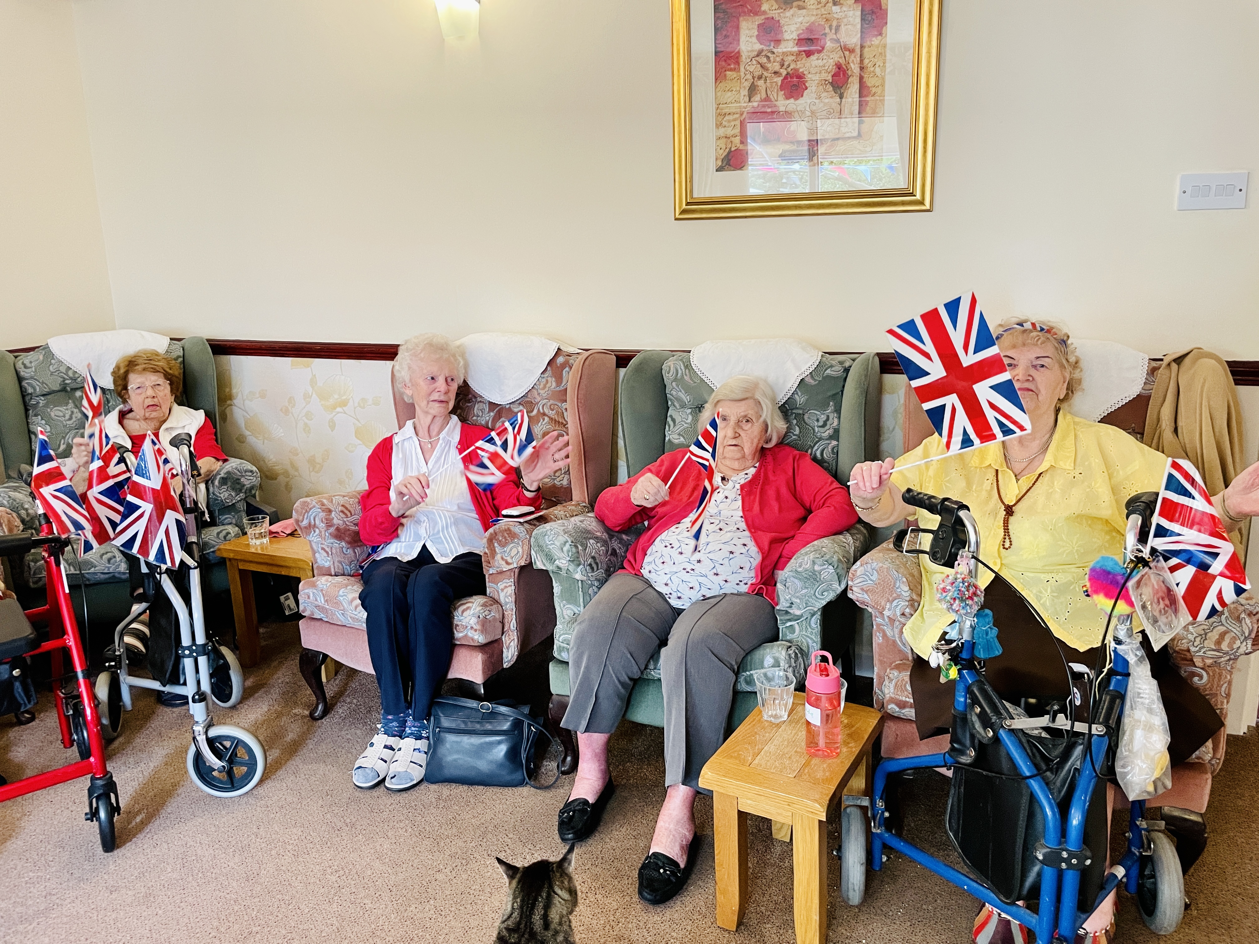 Our ladies waving flags for the Queen's Jubilee